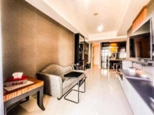 Living room of the Grand Sungkono Lagoon 2BR Apartment in Caspian Tower