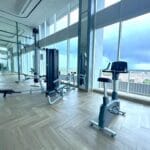 Gym charming 2br apartment di amor pakuwon city mall