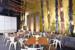 Restaurant seating area at MaxOne Dharmahusada